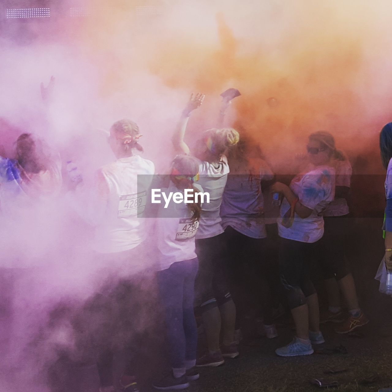 large group of people, real people, celebration, enjoyment, fun, leisure activity, casual clothing, holi, lifestyles, men, togetherness, dancing, full length, traditional festival, outdoors, standing, powder paint, crowd, day, people