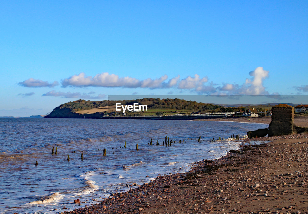 Scenic view of beach against sky