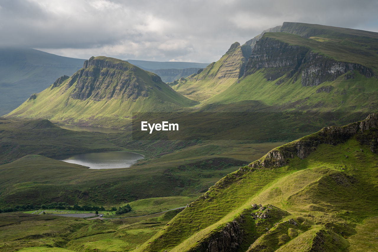 Scenic view of rock formations against sky in quiraing, isle of skye, scotland