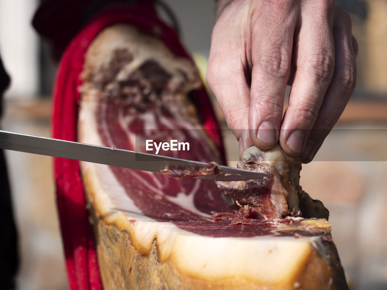 hand, food, food and drink, freshness, one person, meat, close-up, holding, adult, occupation, focus on foreground, baked, indoors