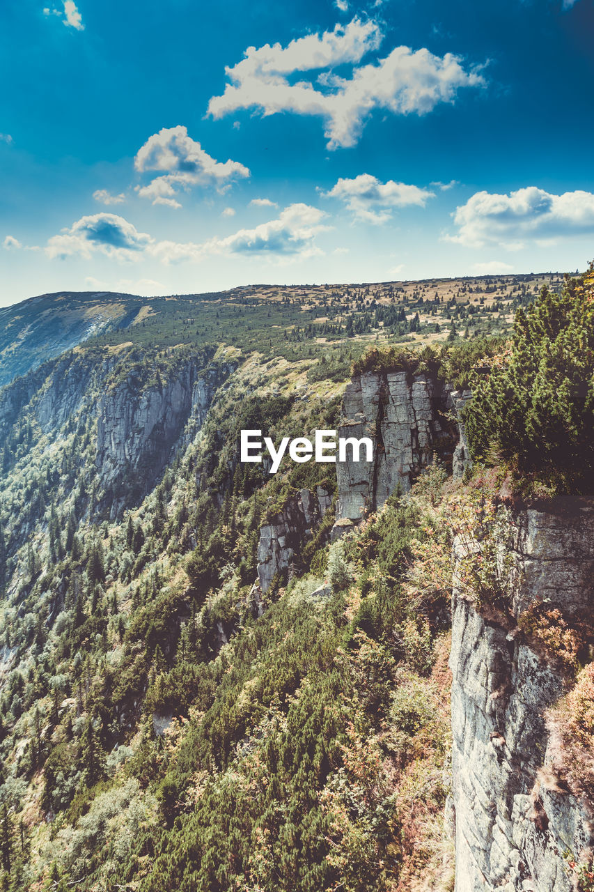 Scenic view of rocky mountains against sky