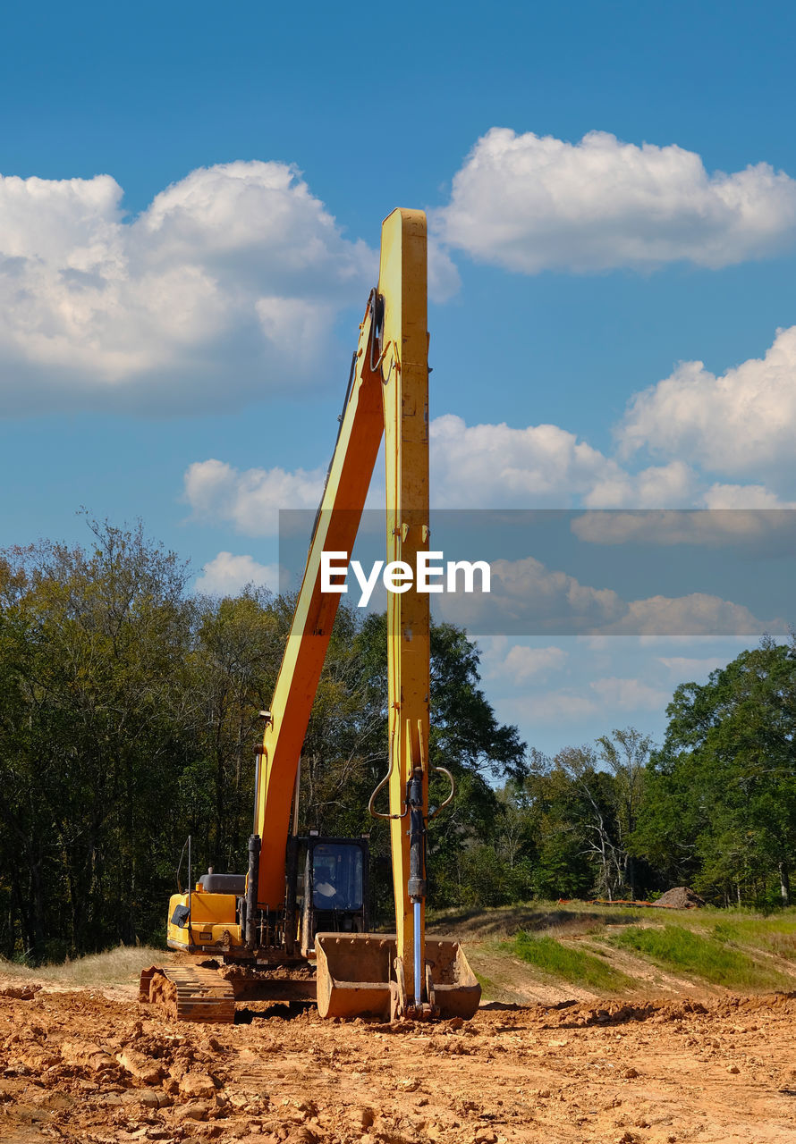 CRANE AT CONSTRUCTION SITE