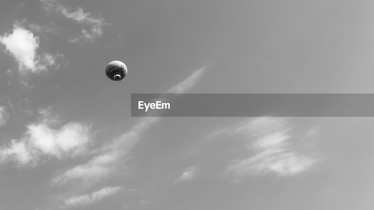 LOW ANGLE VIEW OF BALLOON AGAINST SKY