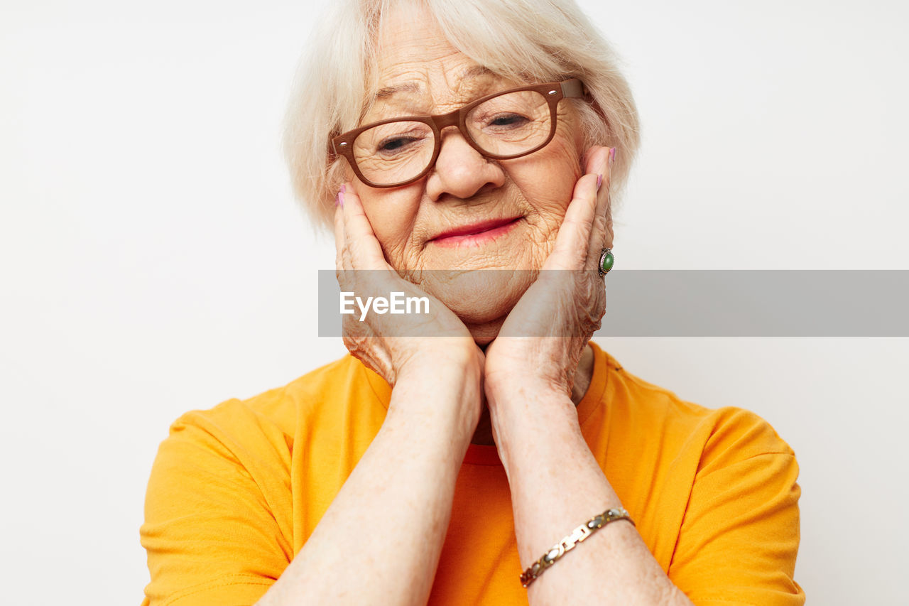 cropped image of woman with face paint against white background