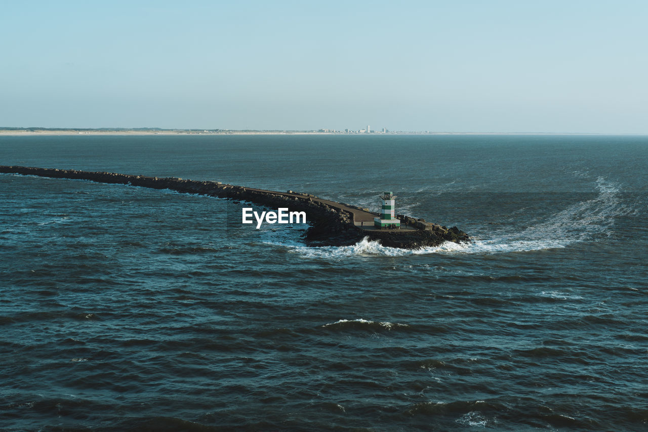 Scenic view of sea against clear sky