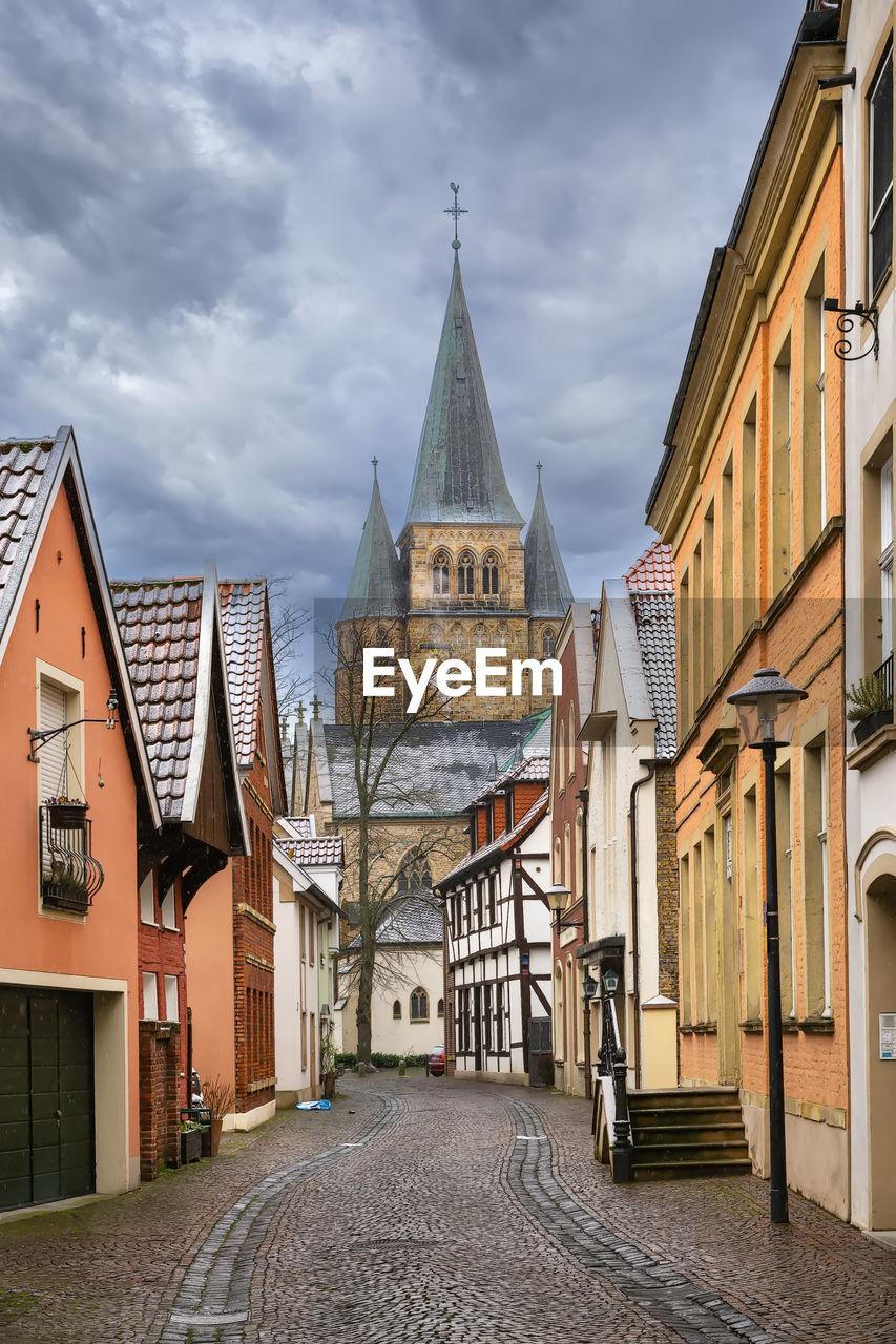 Street in warendorf with view of church of saint lawrence, germany