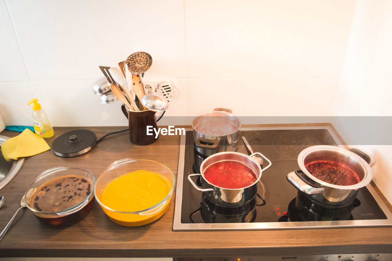 HIGH ANGLE VIEW OF VARIOUS FOOD ON TABLE AT HOME