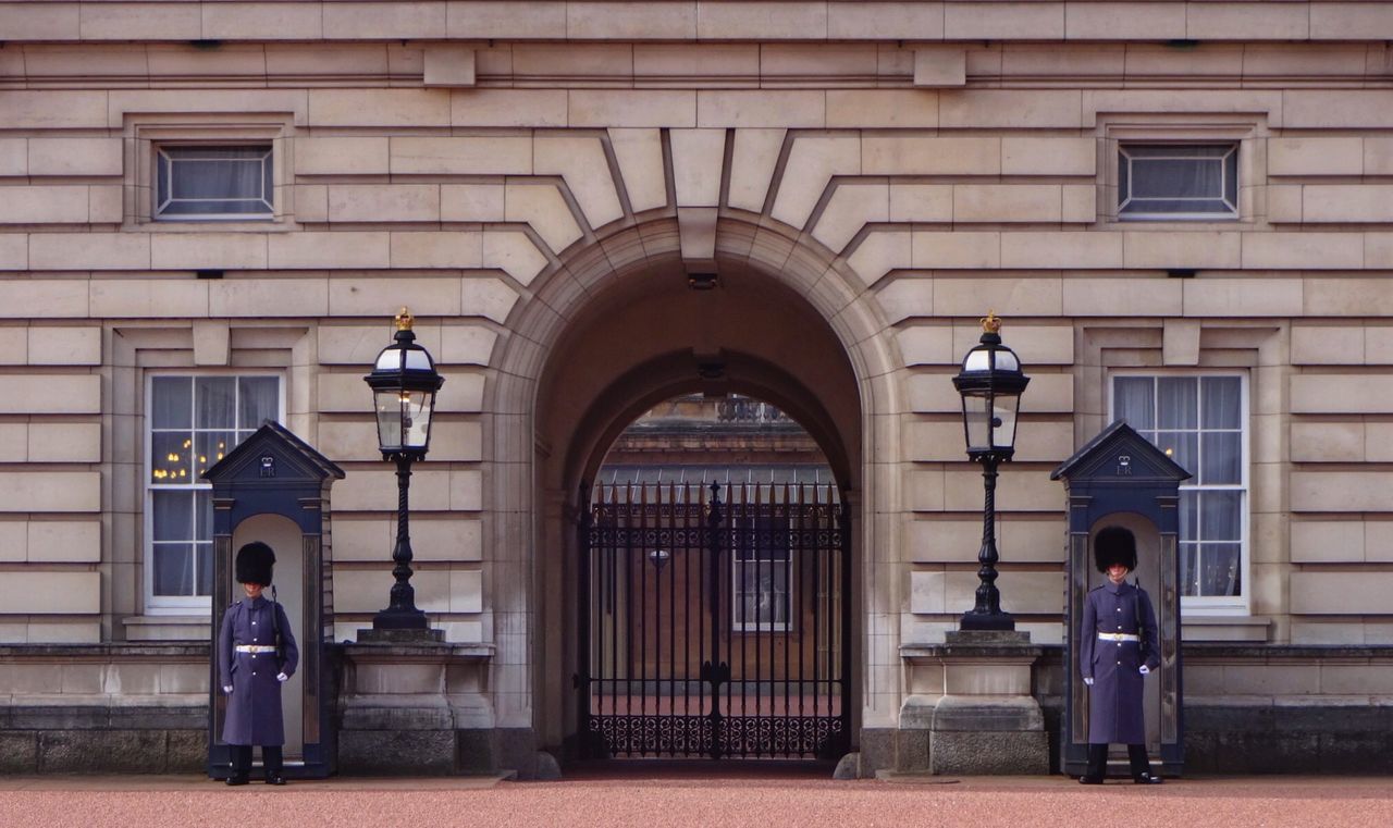 VIEW OF WOMAN WALKING IN CORRIDOR