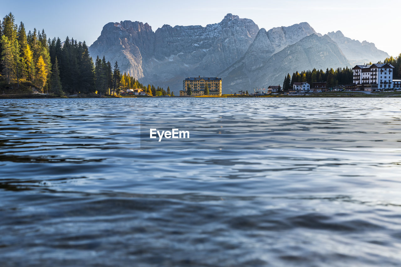 Magical reflections on the misurina lake. sunsets on the dolomites.