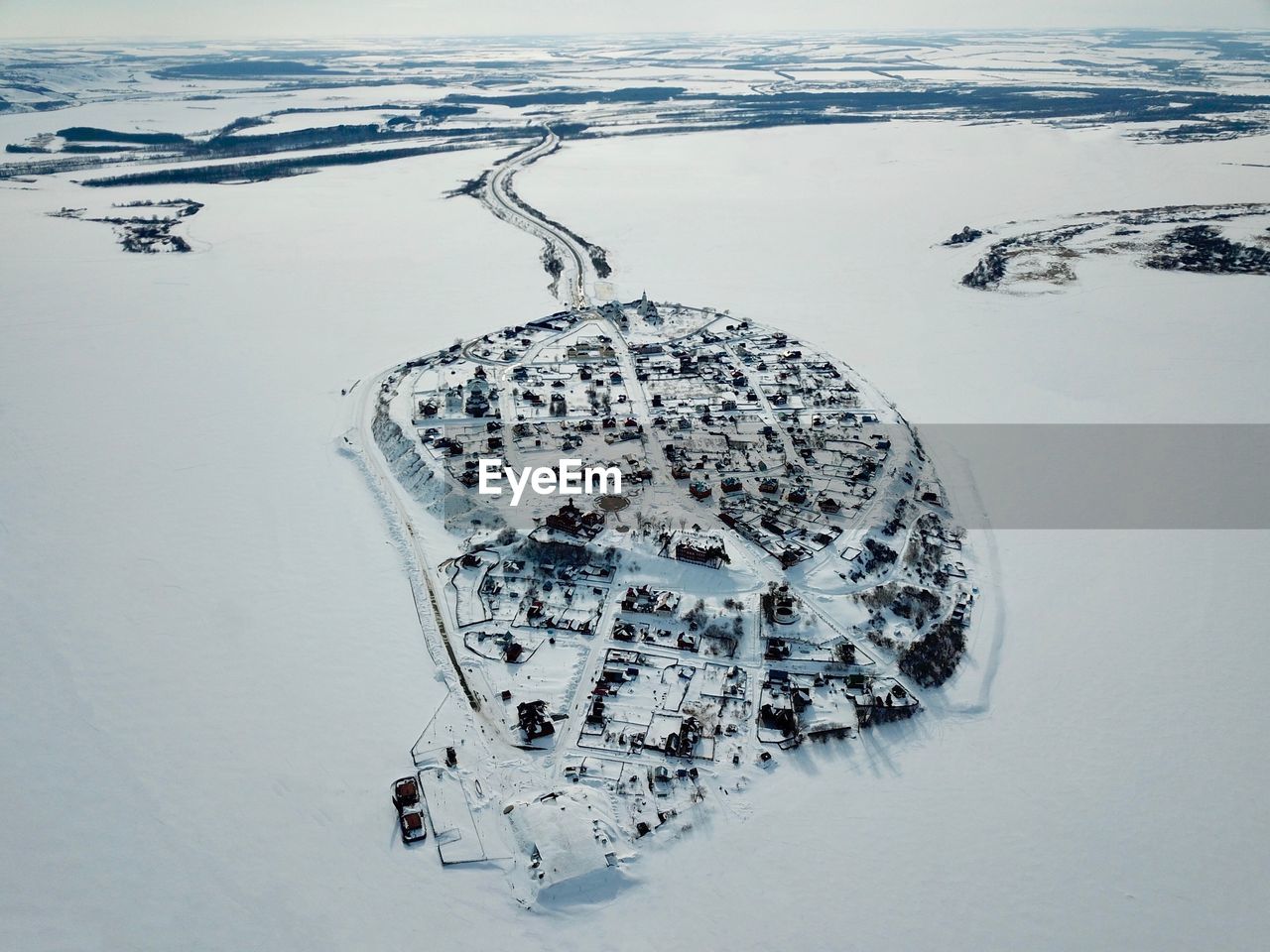 HIGH ANGLE VIEW OF SNOW ON LAND