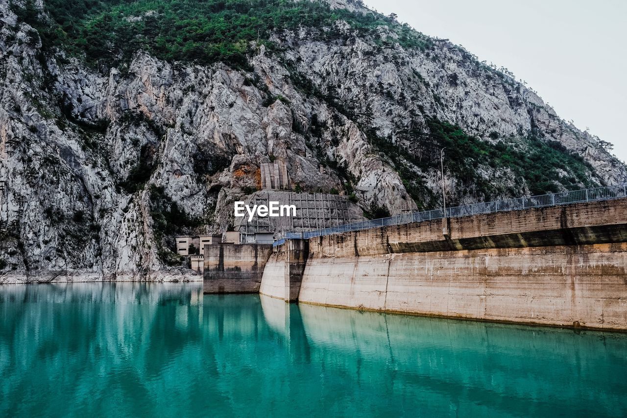 View of dam against mountain