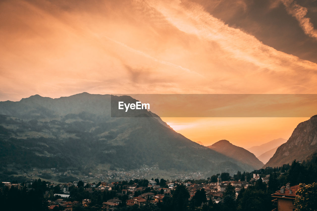 Scenic view of mountains against sky during sunset