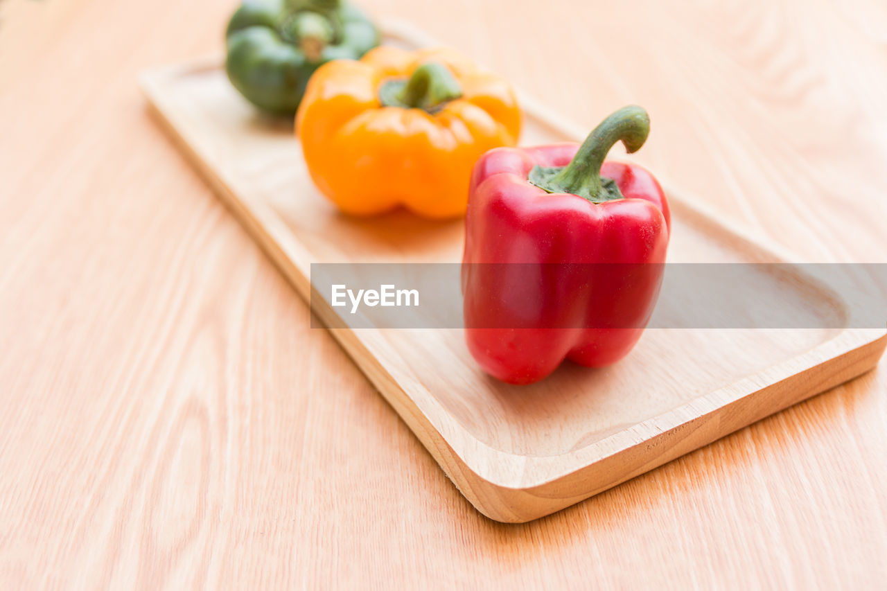 Close-up of bell peppers on cutting board