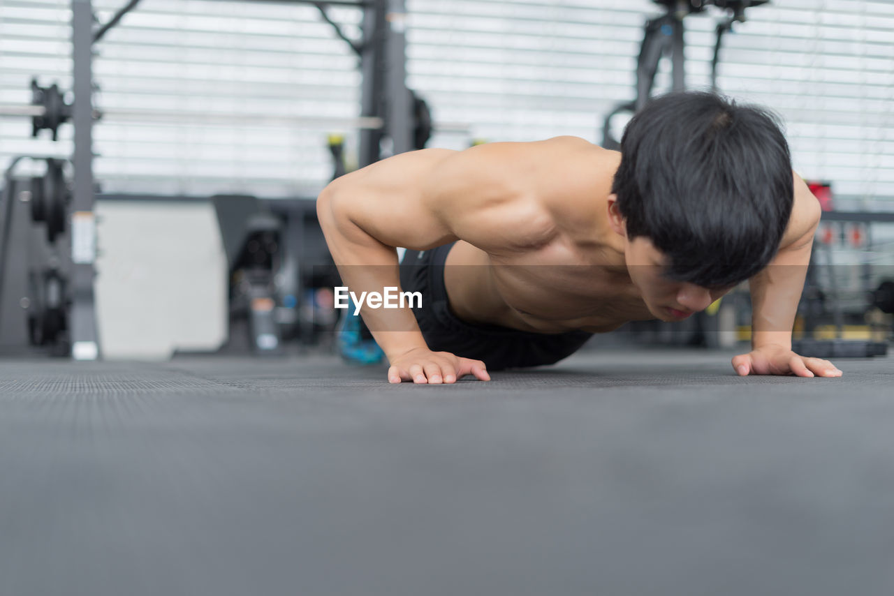 Man exercising in gym