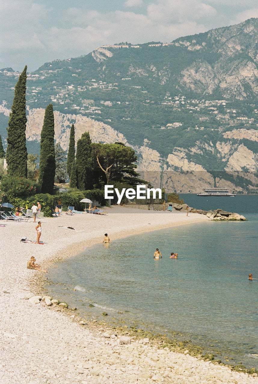 Scenic view of a beach at lago di garda in italy. shot on 35mm kodak portra 800 film.