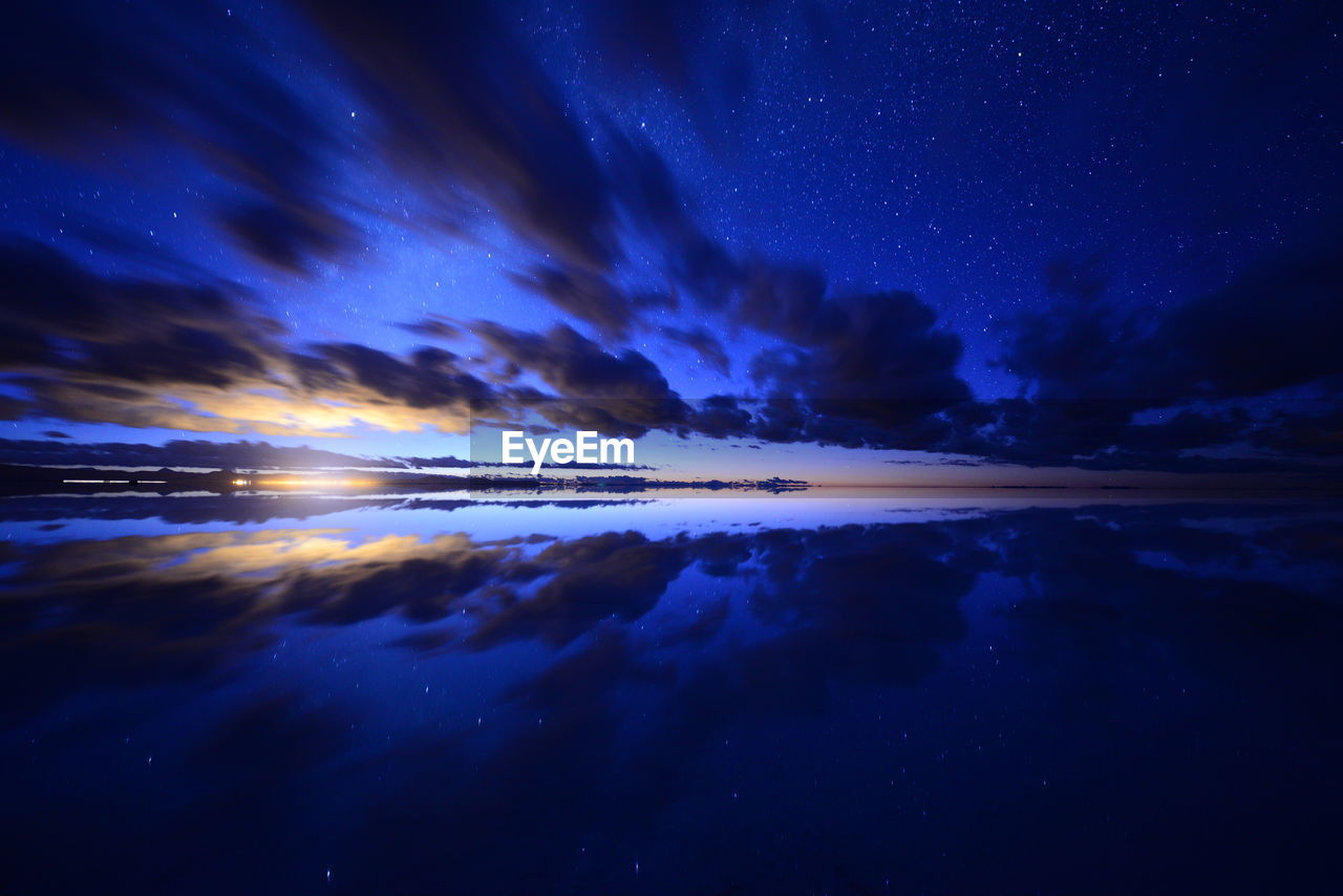 Scenic view of sea against sky at dusk