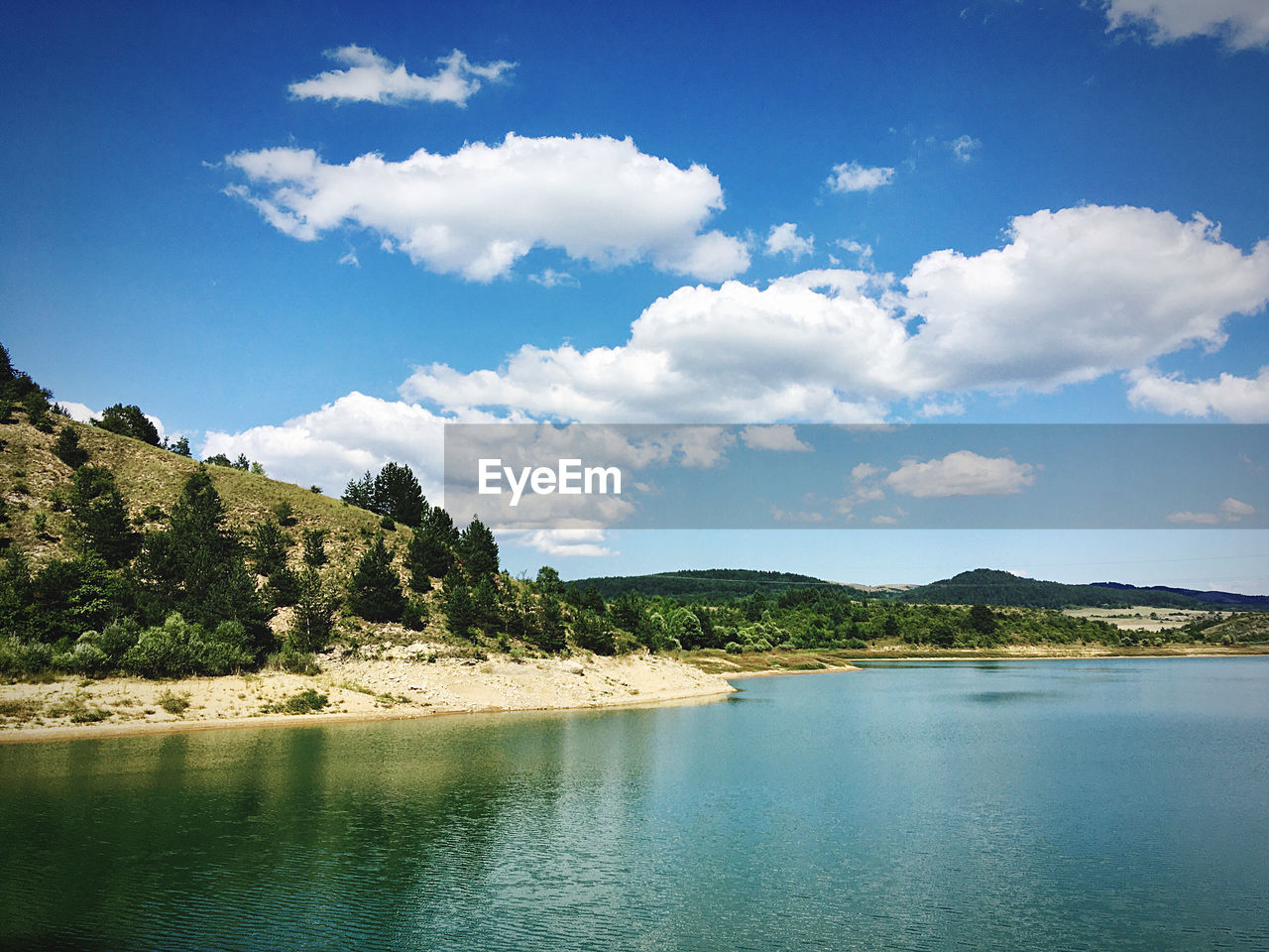 SCENIC VIEW OF LANDSCAPE AGAINST BLUE SKY