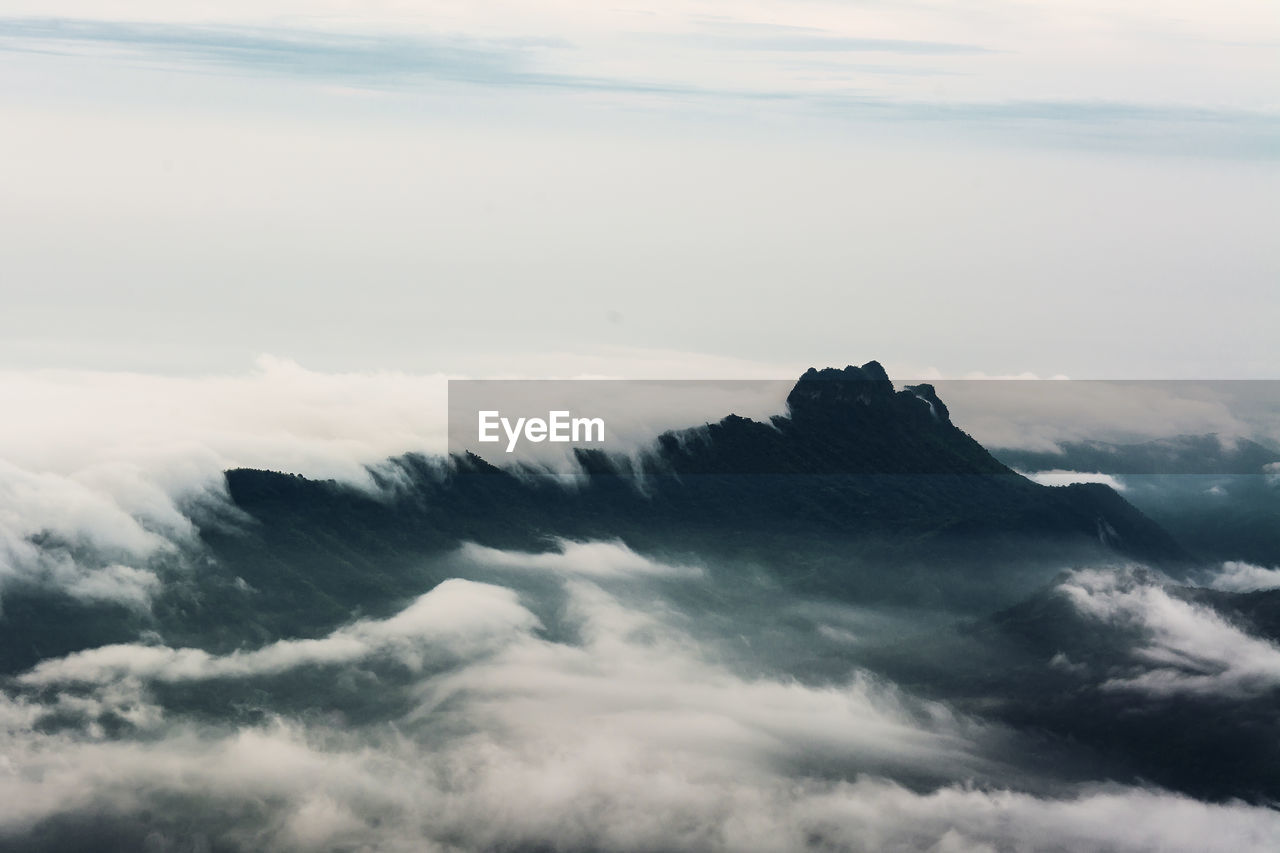 Scenic view of cloudscape and mountains