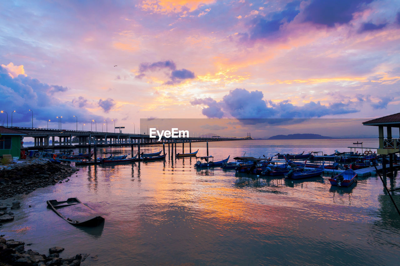 Scenic view of sea against sky at sunset