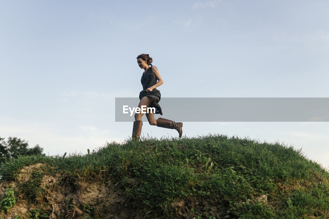 Woman runs down the hill