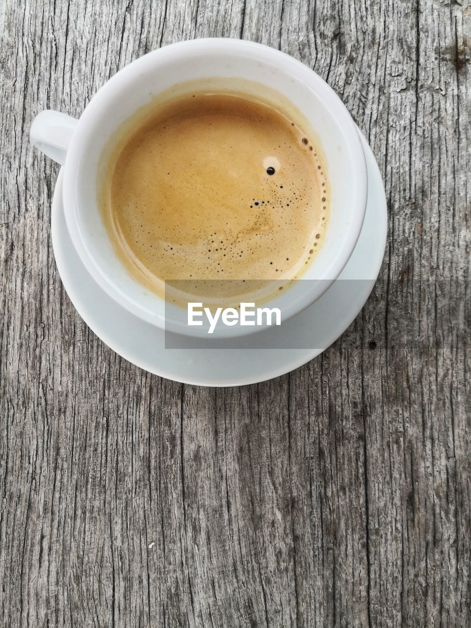 CLOSE-UP OF COFFEE ON TABLE