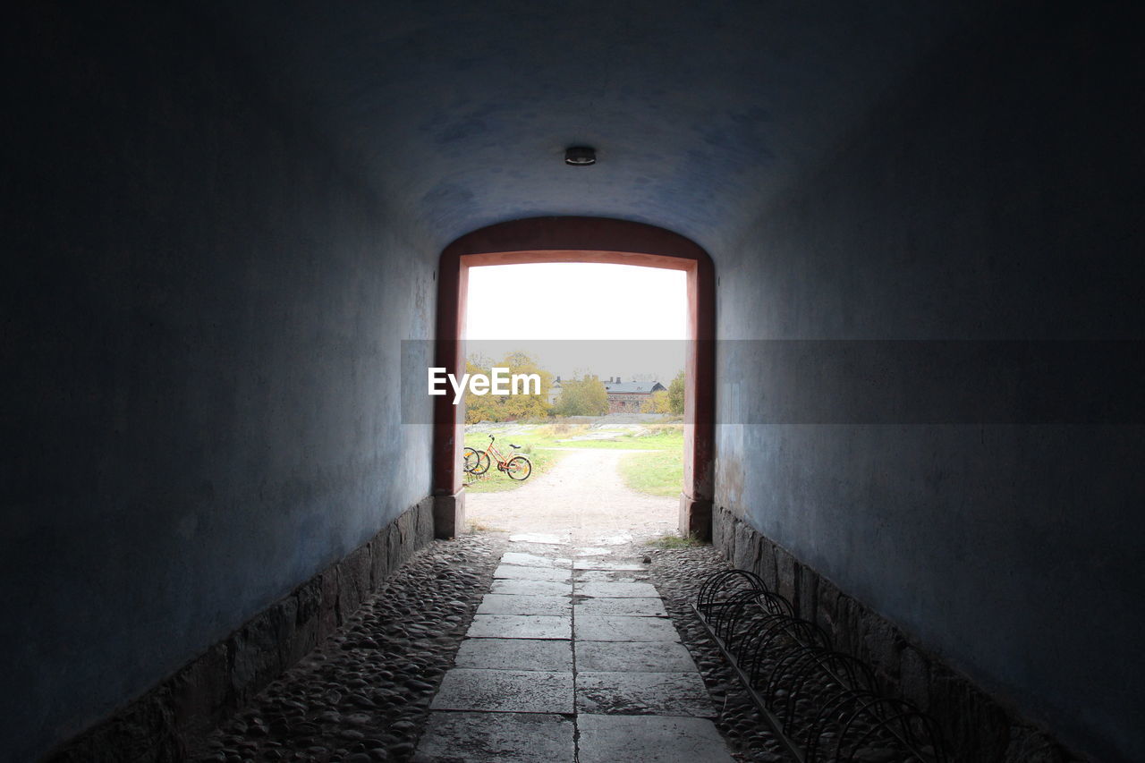 View of field seen through tunnel at suomenlinna