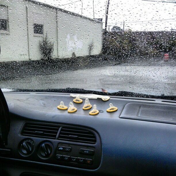 CLOSE-UP OF WATER DROPS ON WINDOW