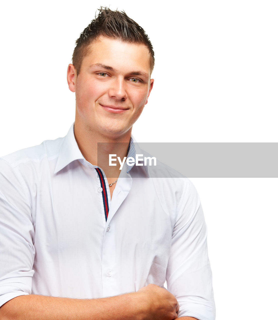 one person, smiling, portrait, adult, white background, finger, men, happiness, studio shot, emotion, young adult, cut out, looking at camera, indoors, casual clothing, person, relaxation, white, cheerful, clothing, positive emotion, waist up, hand, sleeve, human face, teeth, business, smile, arm, front view, button down shirt, shirt, polo shirt, occupation, lifestyles, copy space, looking, white-collar worker, arms crossed, professional occupation, businessman, standing