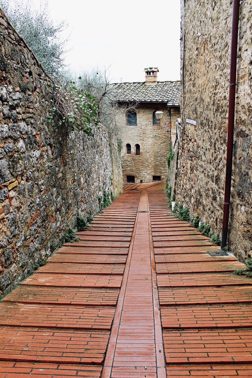 WALKWAY AMIDST BUILDINGS