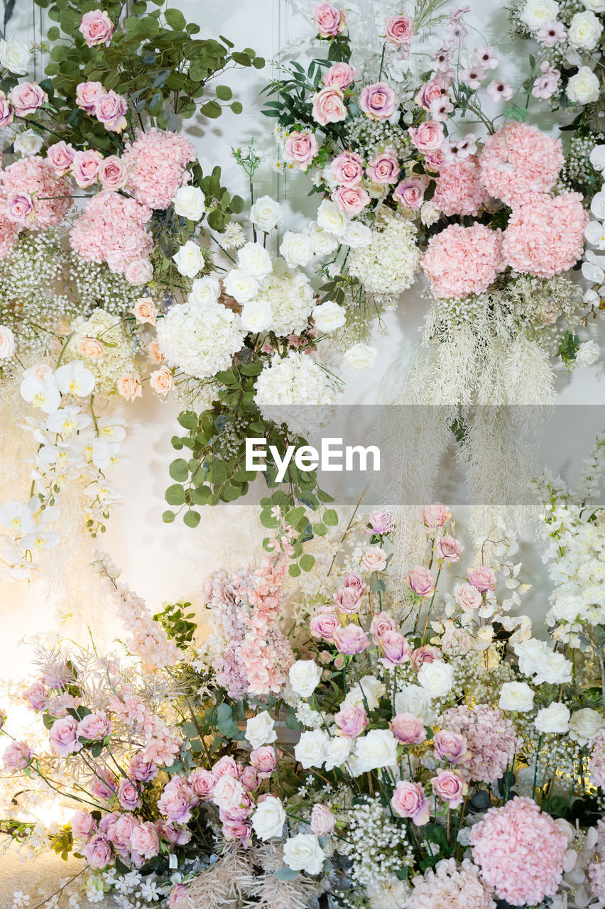 plant, flower, flowering plant, blossom, beauty in nature, pink, freshness, nature, floristry, no people, fragility, growth, day, outdoors, springtime, lilac, bouquet, water, floral design, flower arrangement, spring, branch, close-up, high angle view, flower head, cherry blossom, multi colored