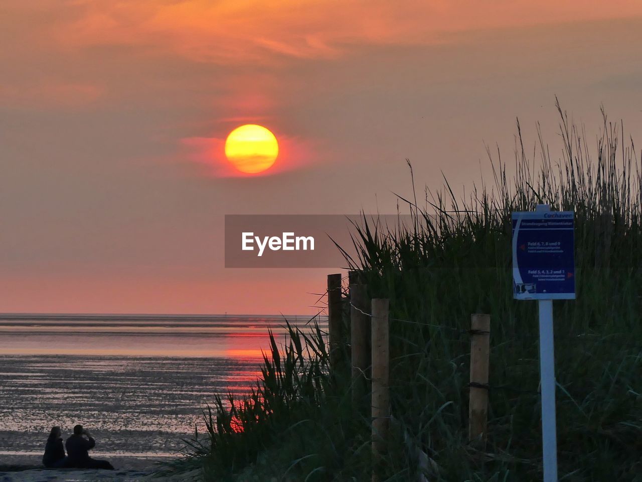 View of calm sea at sunset