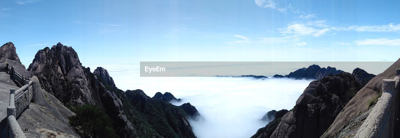 Panoramic view of rocky mountains against sky