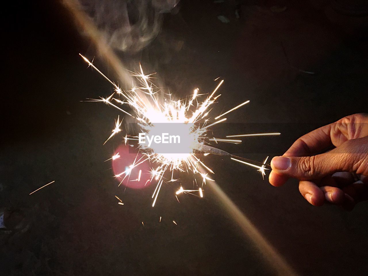 LOW ANGLE VIEW OF FIREWORK DISPLAY