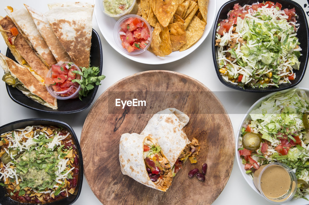 Directly above shot of food served on table