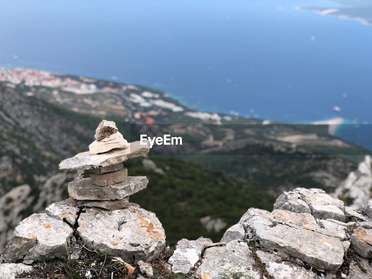 STACK OF ROCKS ON SHORE