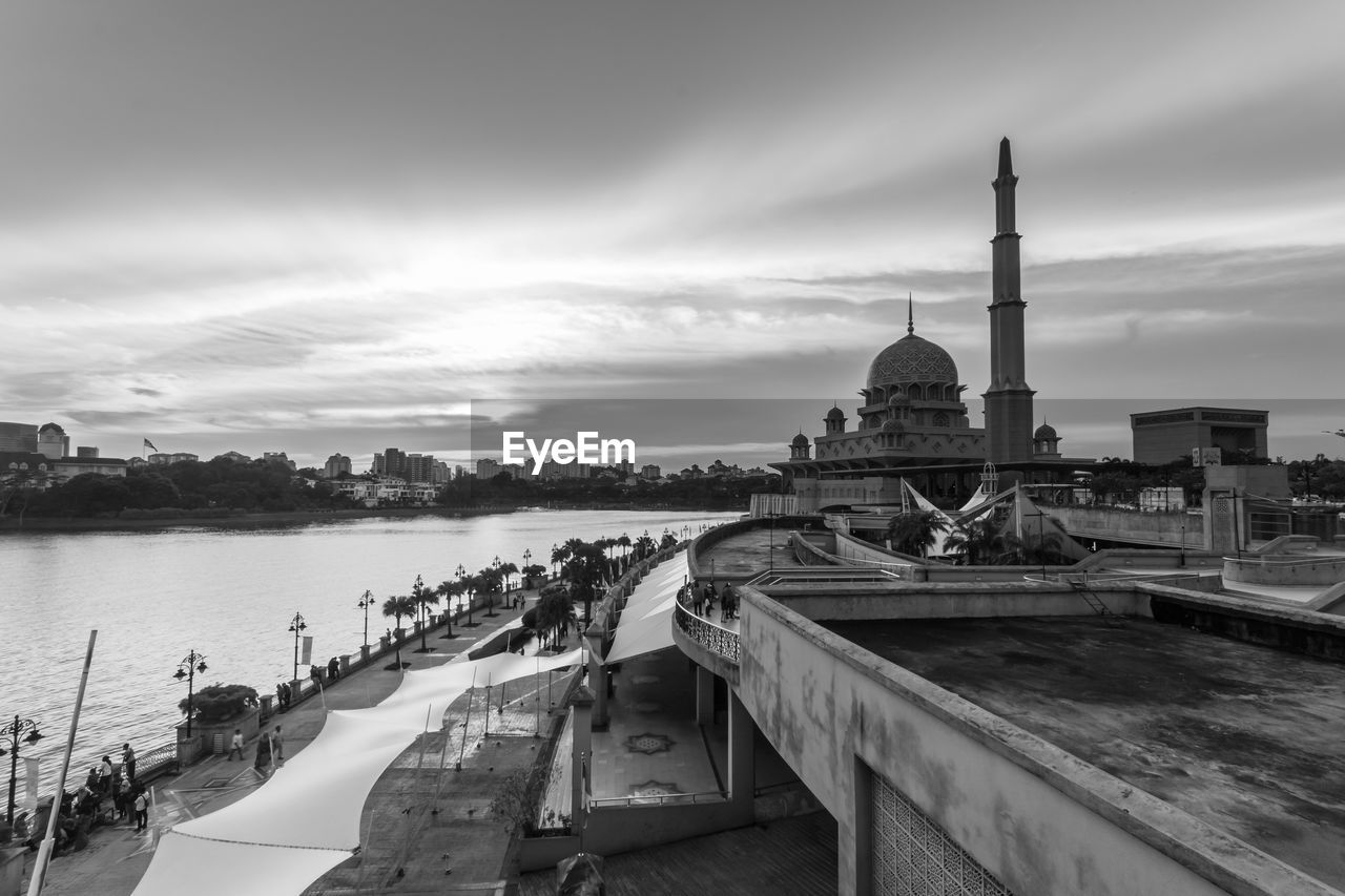 PANORAMIC VIEW OF BUILDINGS AT RIVERBANK