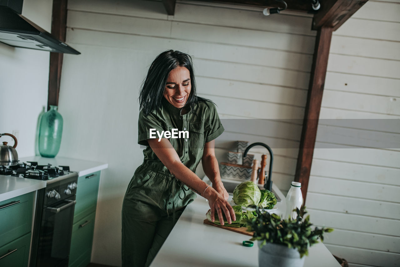 Woman standing at home