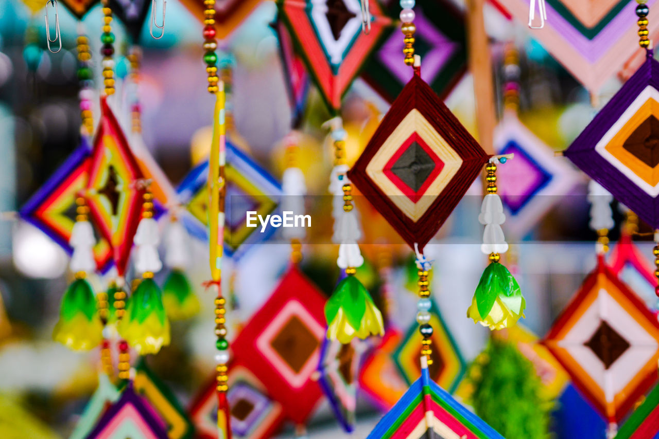 FULL FRAME SHOT OF MULTI COLORED UMBRELLAS HANGING FOR SALE