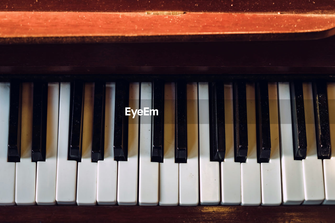 musical instrument, music, musical equipment, piano, piano key, arts culture and entertainment, electric piano, string instrument, electronic device, digital piano, keyboard, computer component, celesta, keyboard instrument, no people, electronic instrument, close-up, indoors, musical keyboard, white, black, electronic keyboard, wood