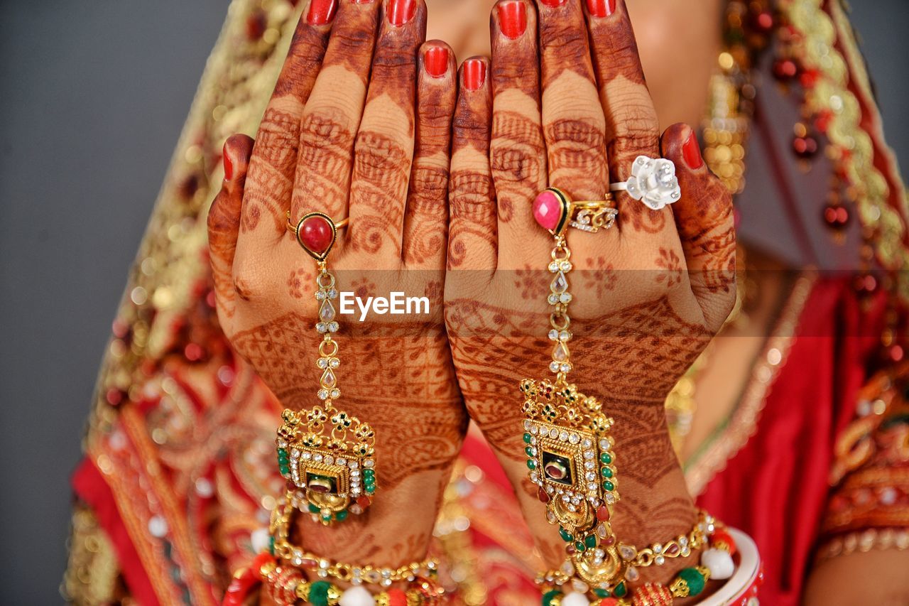 Close-up of bride with henna tattoo