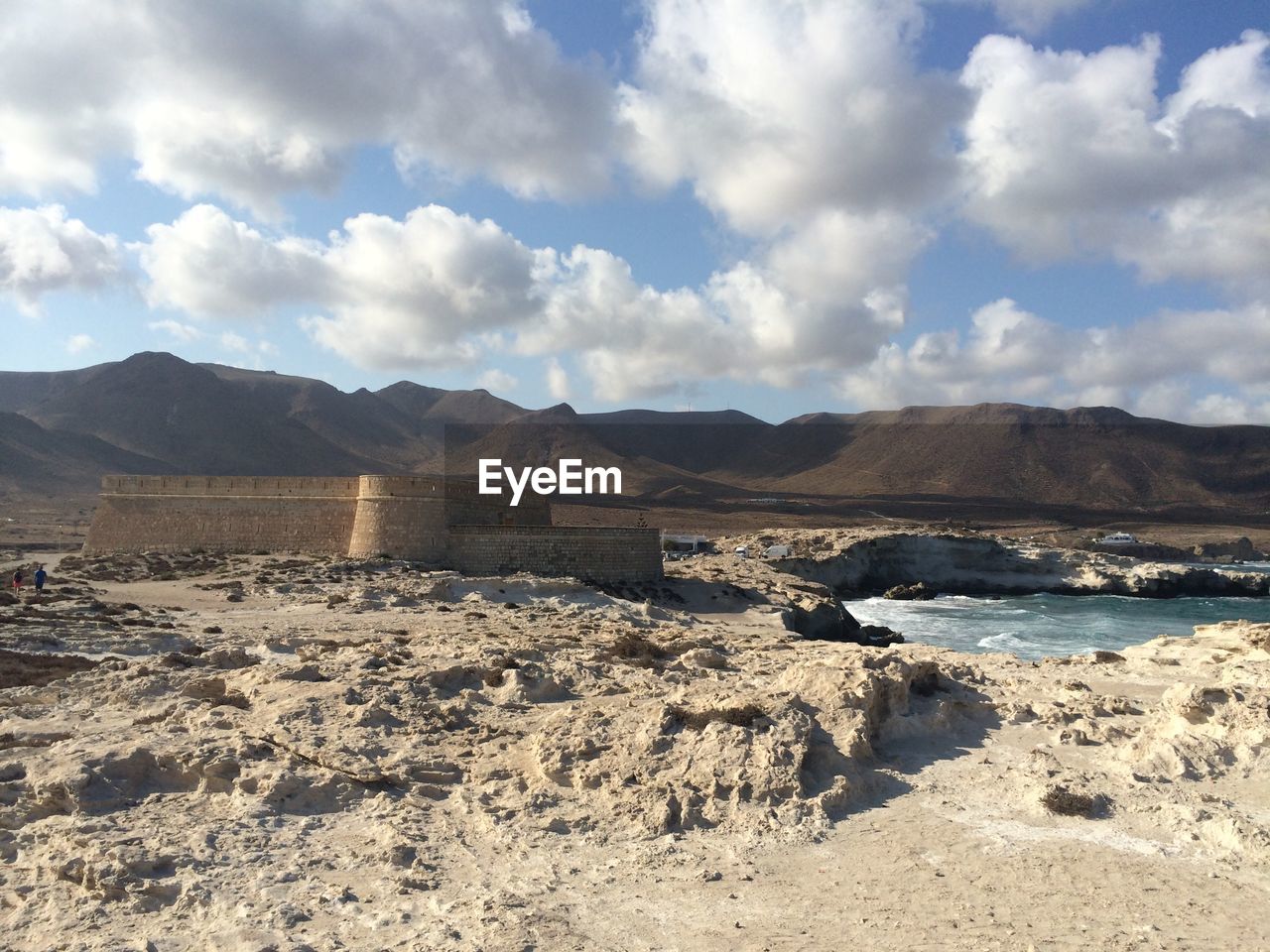 Scenic view of land against sky