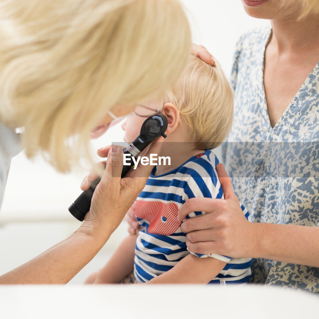 high angle view of young woman using phone