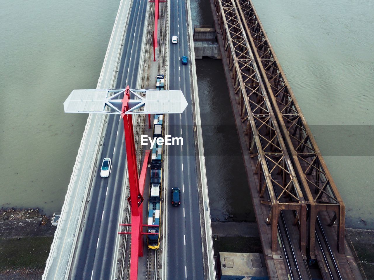HIGH ANGLE VIEW OF BRIDGE OVER RIVER AGAINST CLEAR SKY