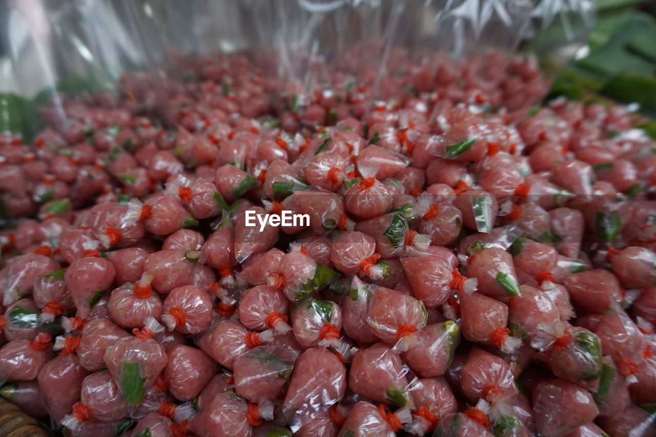 HIGH ANGLE VIEW OF CHOPPED TOMATOES AND VEGETABLES