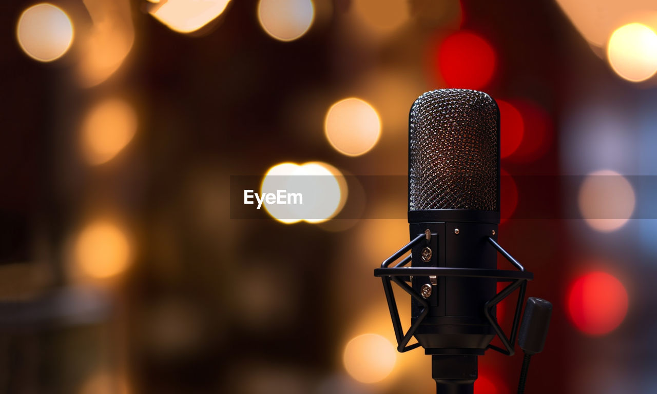 close-up of microphone against defocused background