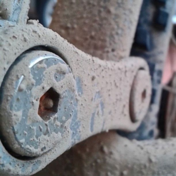 CLOSE-UP OF RUSTY METAL STRUCTURE