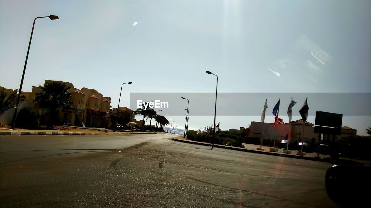 VIEW OF ROAD ALONG BUILDINGS