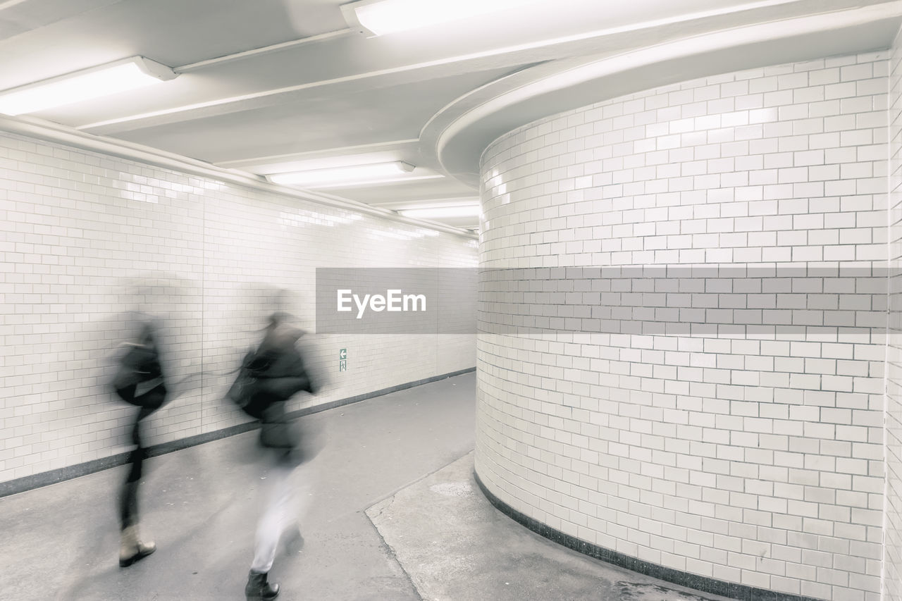 People walking in subway station