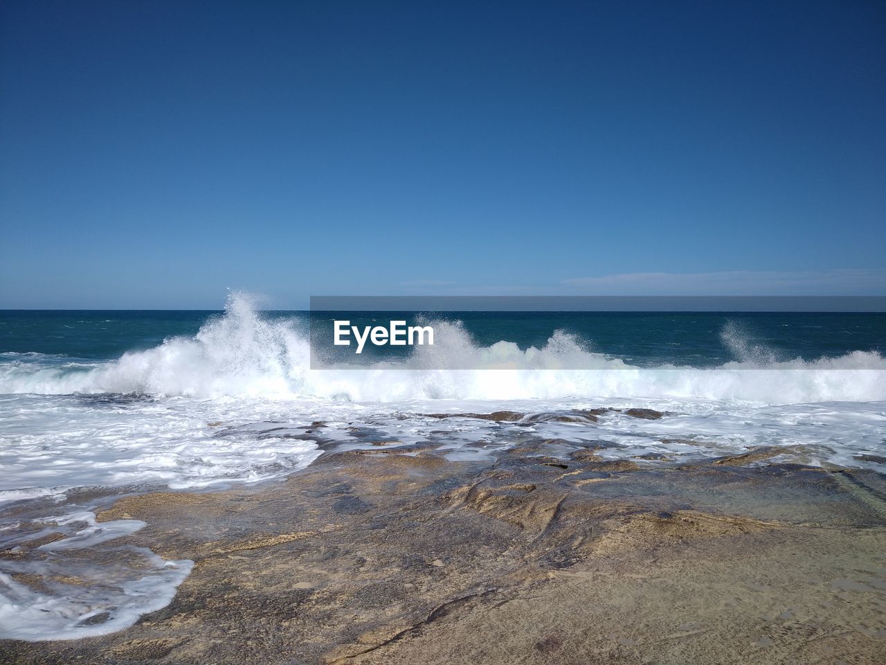 Scenic view of sea against clear sky