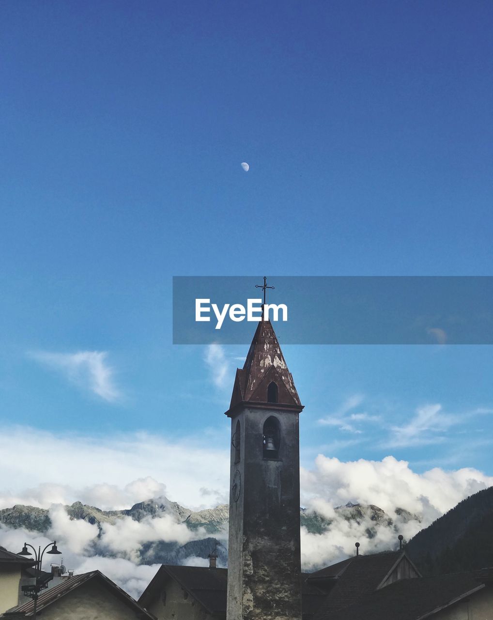 Low angle view of church and building against sky